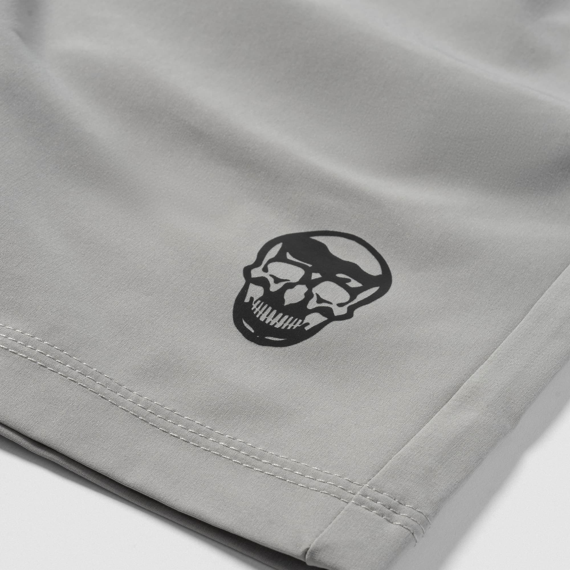 Reflective Gymreapers skull logo detail on Men's Conquer 5 Inch Shorts - Gray