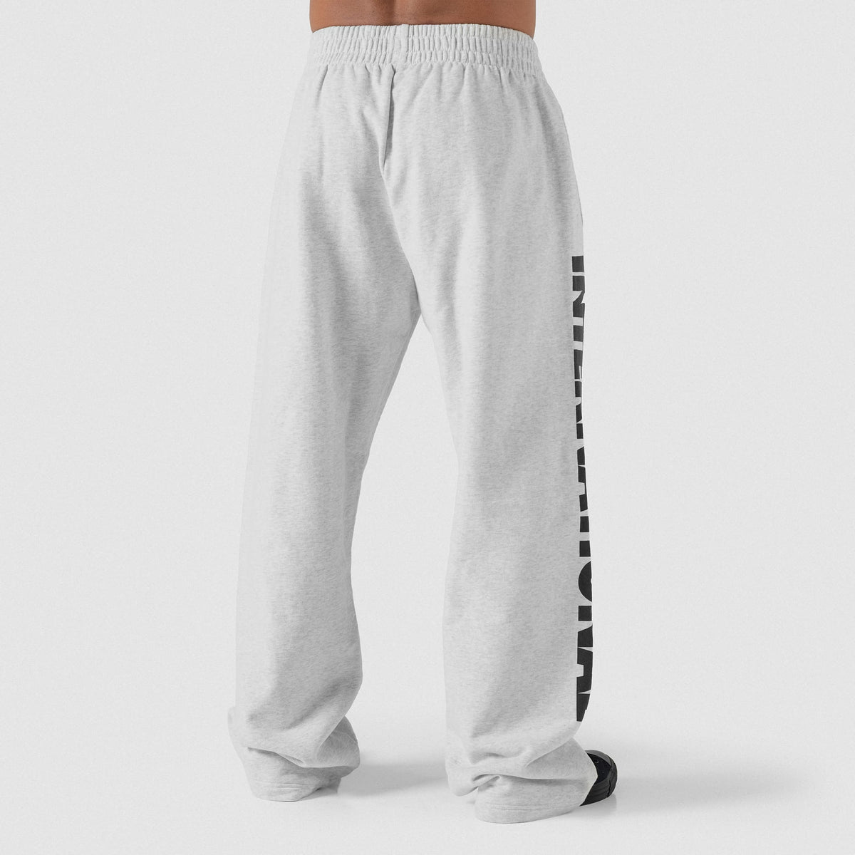 Backside of the gray Olympia International Division Straight-Leg Jogger sweatpants on a male model
