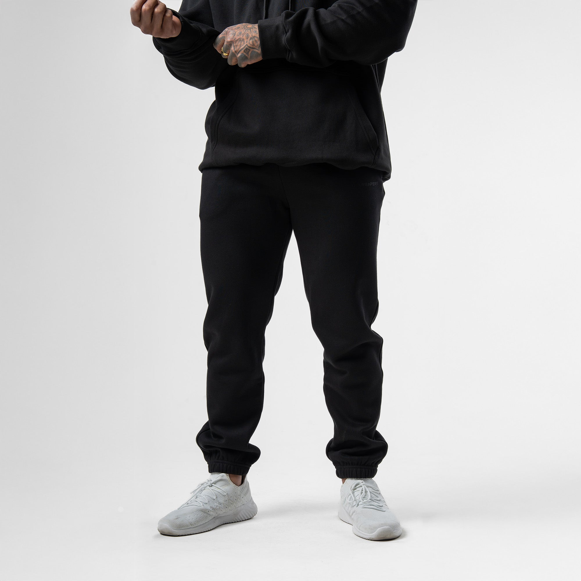 athlete wearing black axis joggers