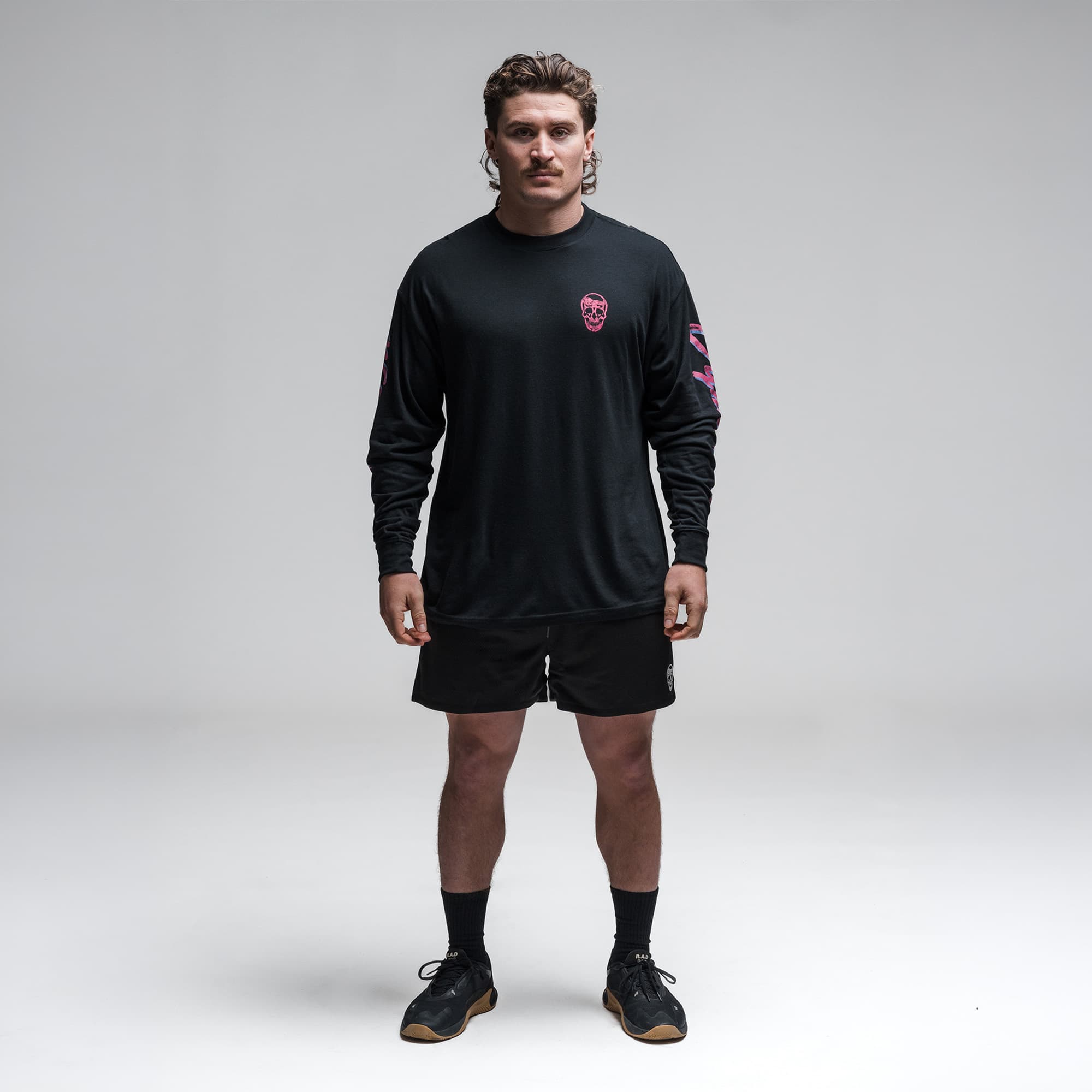 Athlete wearing the Moon Breaker Long Sleeve Shirt full body shot front side