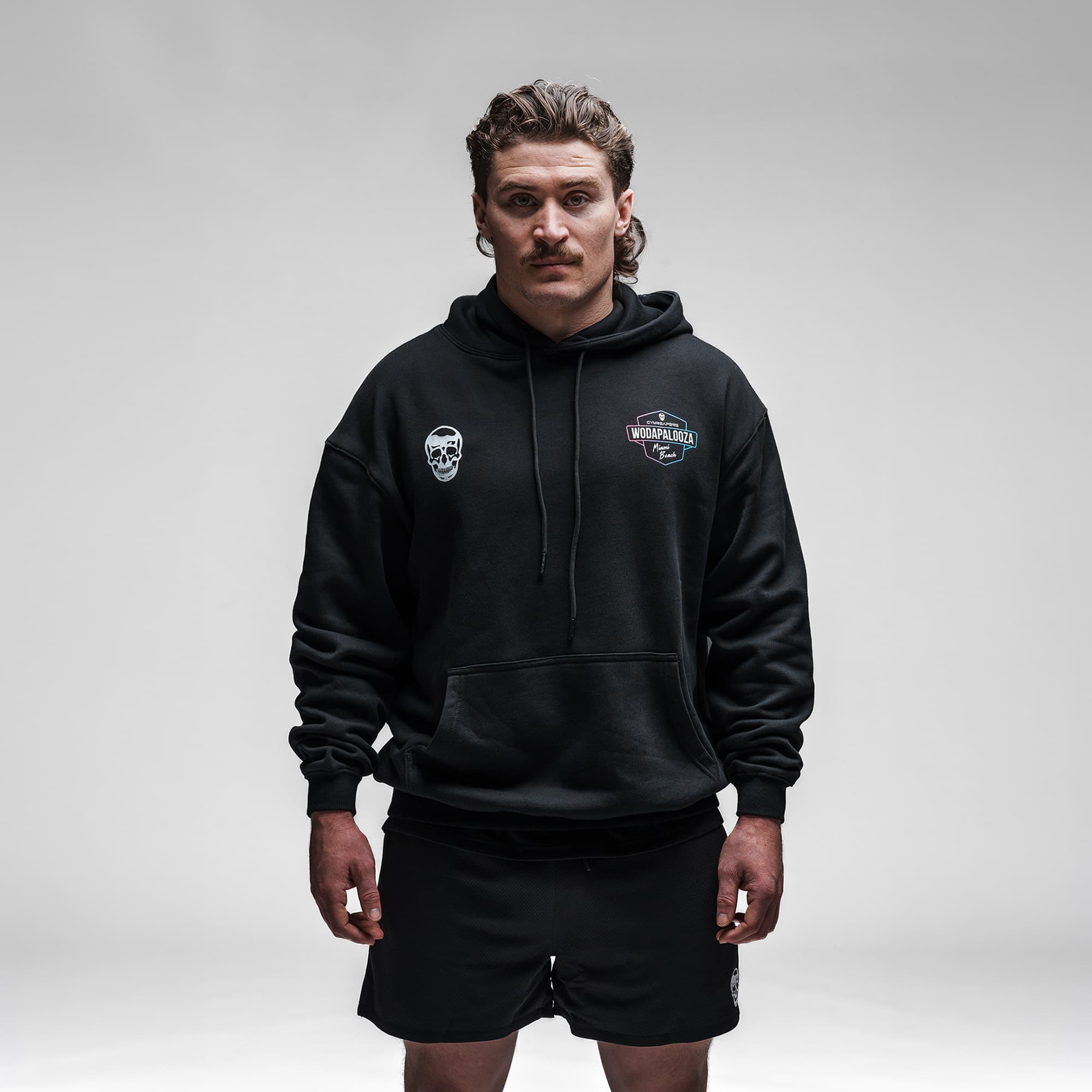 Male athlete wearing the Neon Horizon Hoodie half body shot front view