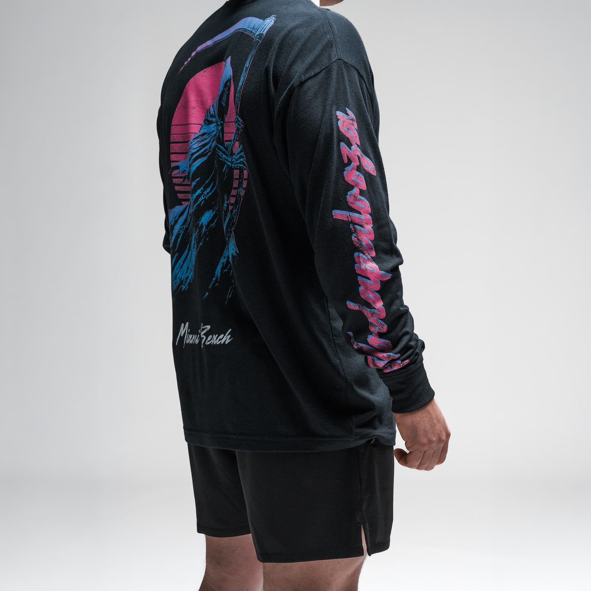 Athlete wearing the Moon Breaker Long Sleeve Shirt detail shot of right sleeve graphics