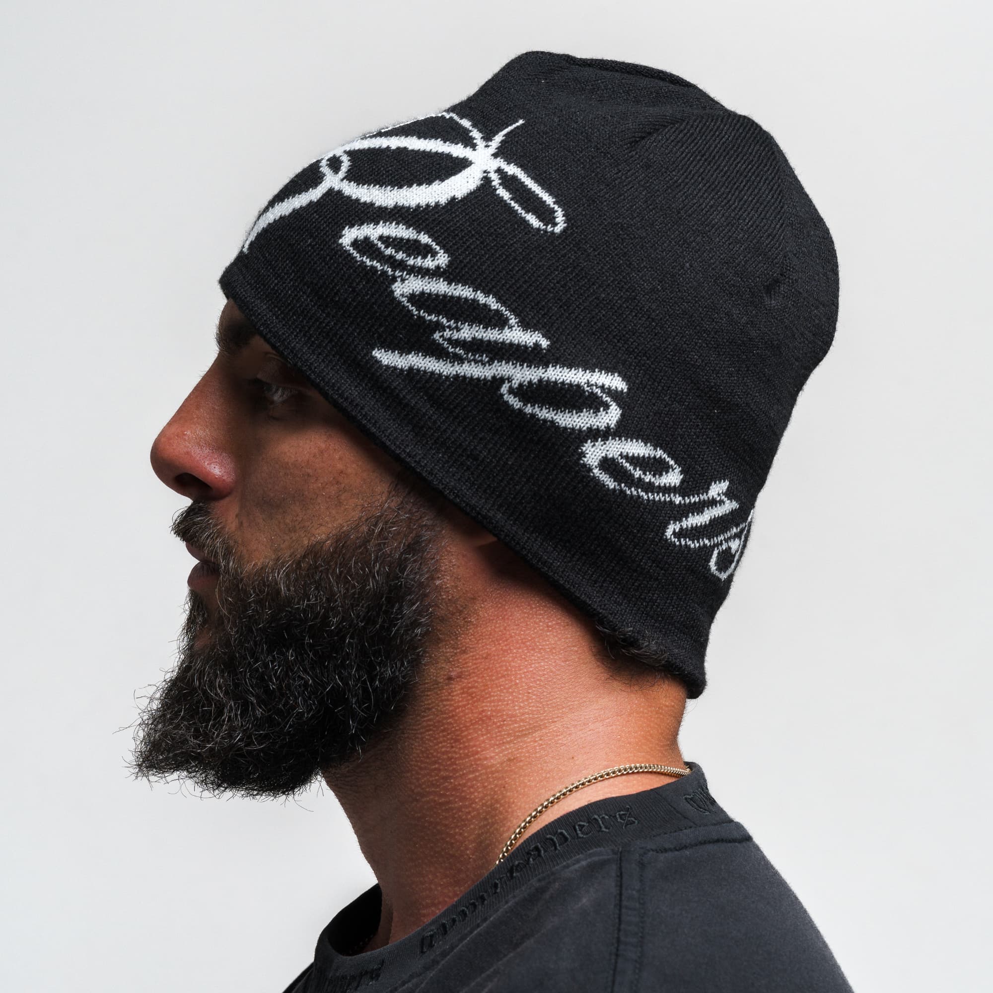 Athlete wearing Reapers Skull Cap Beanie - Black/White side view