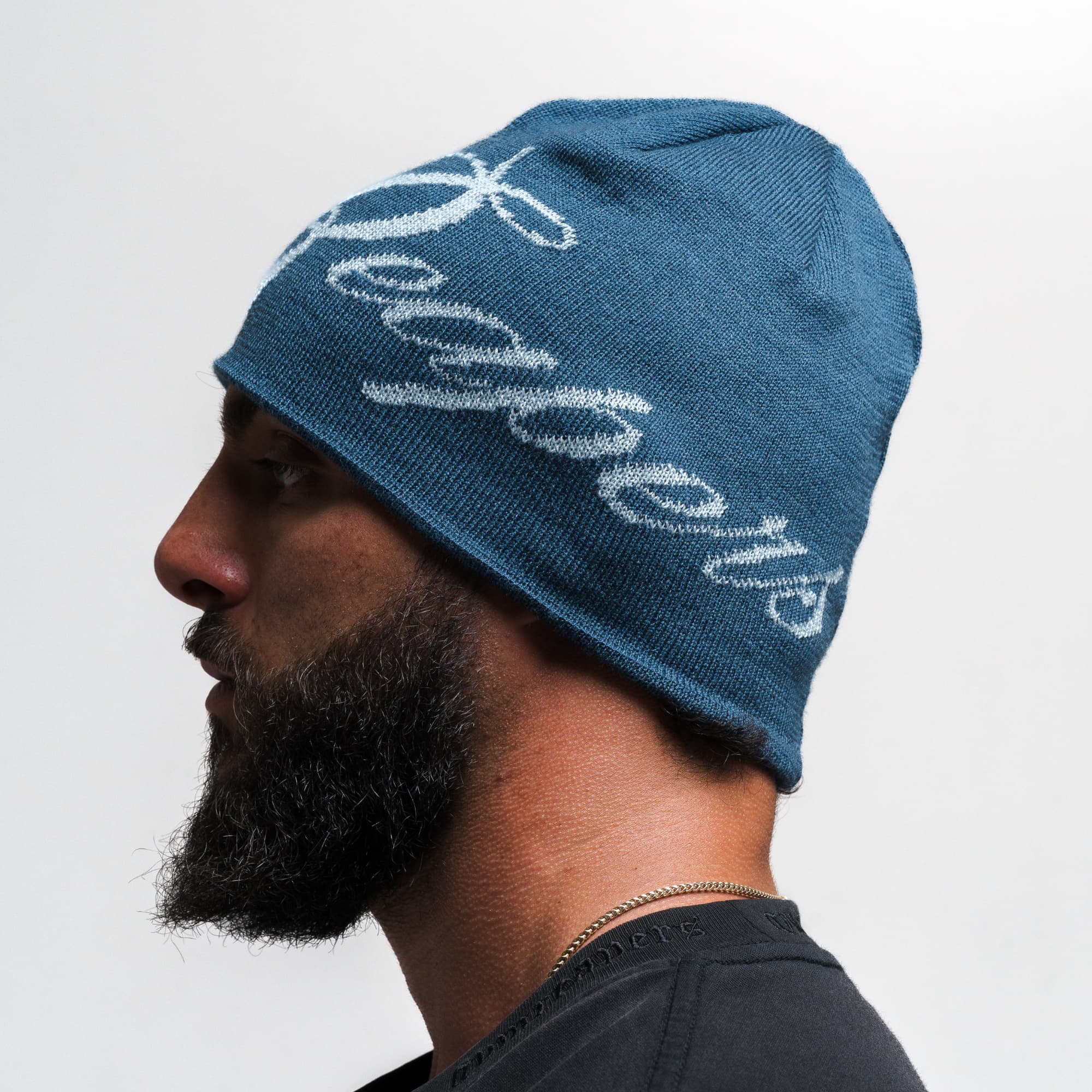 Athlete wearing Reapers Skull Cap Beanie - Blue/Glacier side view