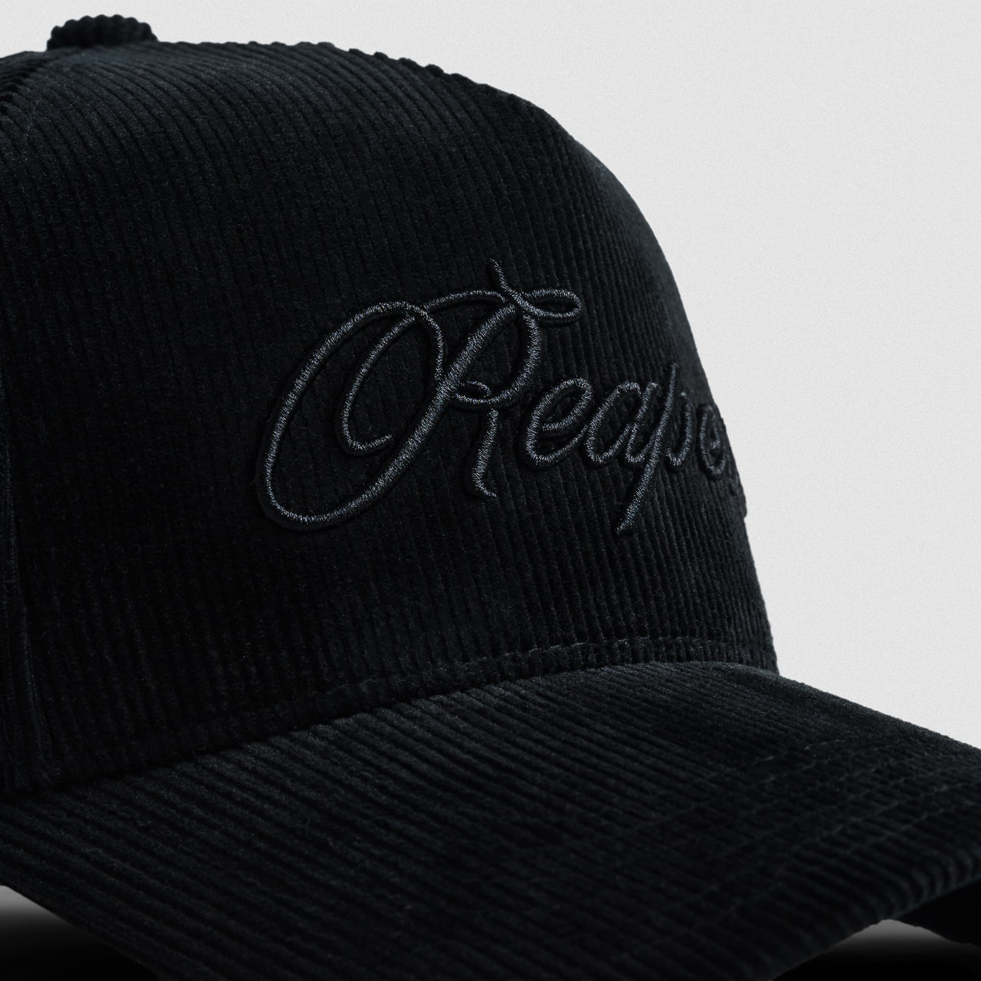 Corduroy Reapers 5-Panel Hat - Black/Black close up detail shot of logo