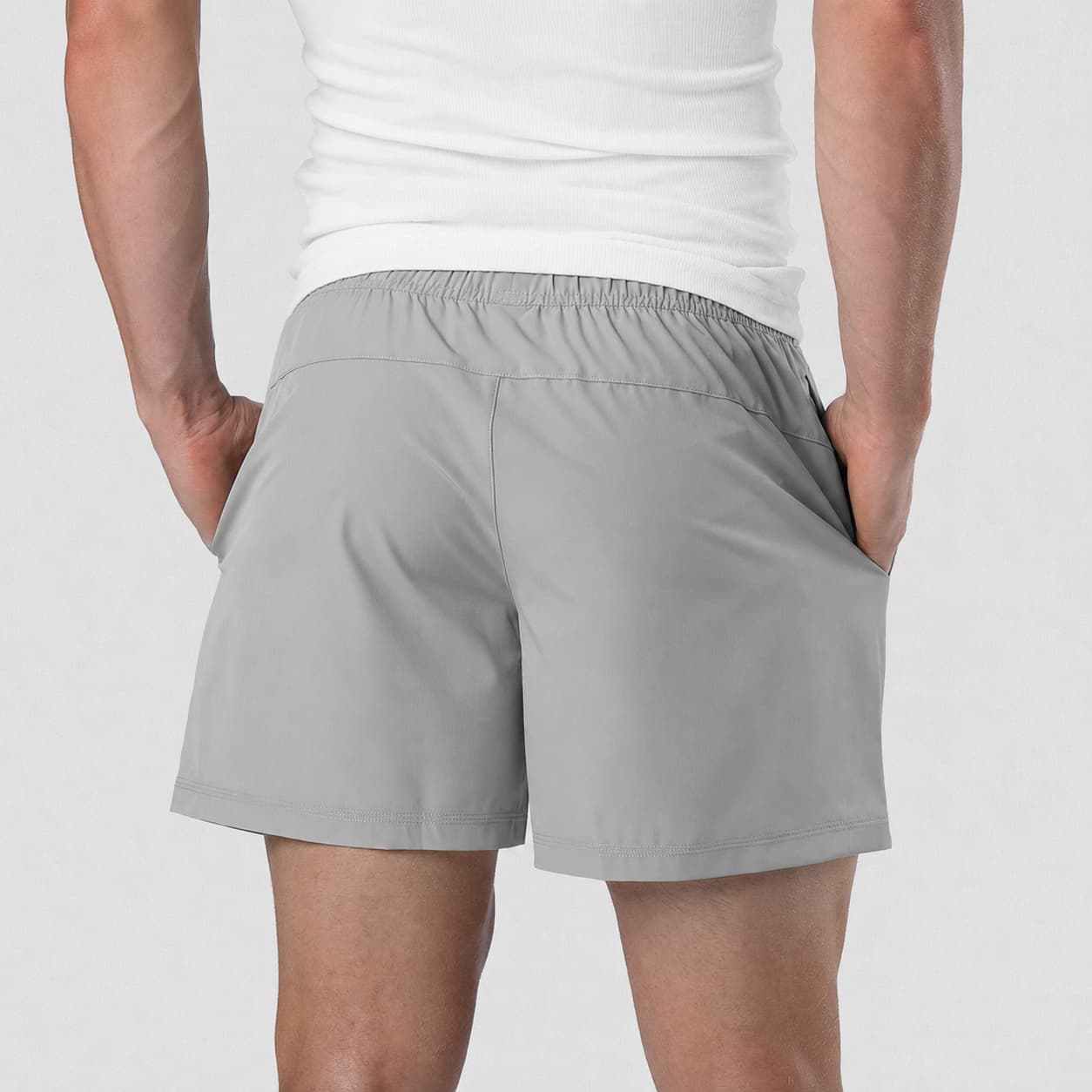 Back view of Men's Conquer 5 Inch Shorts on model - Gray
