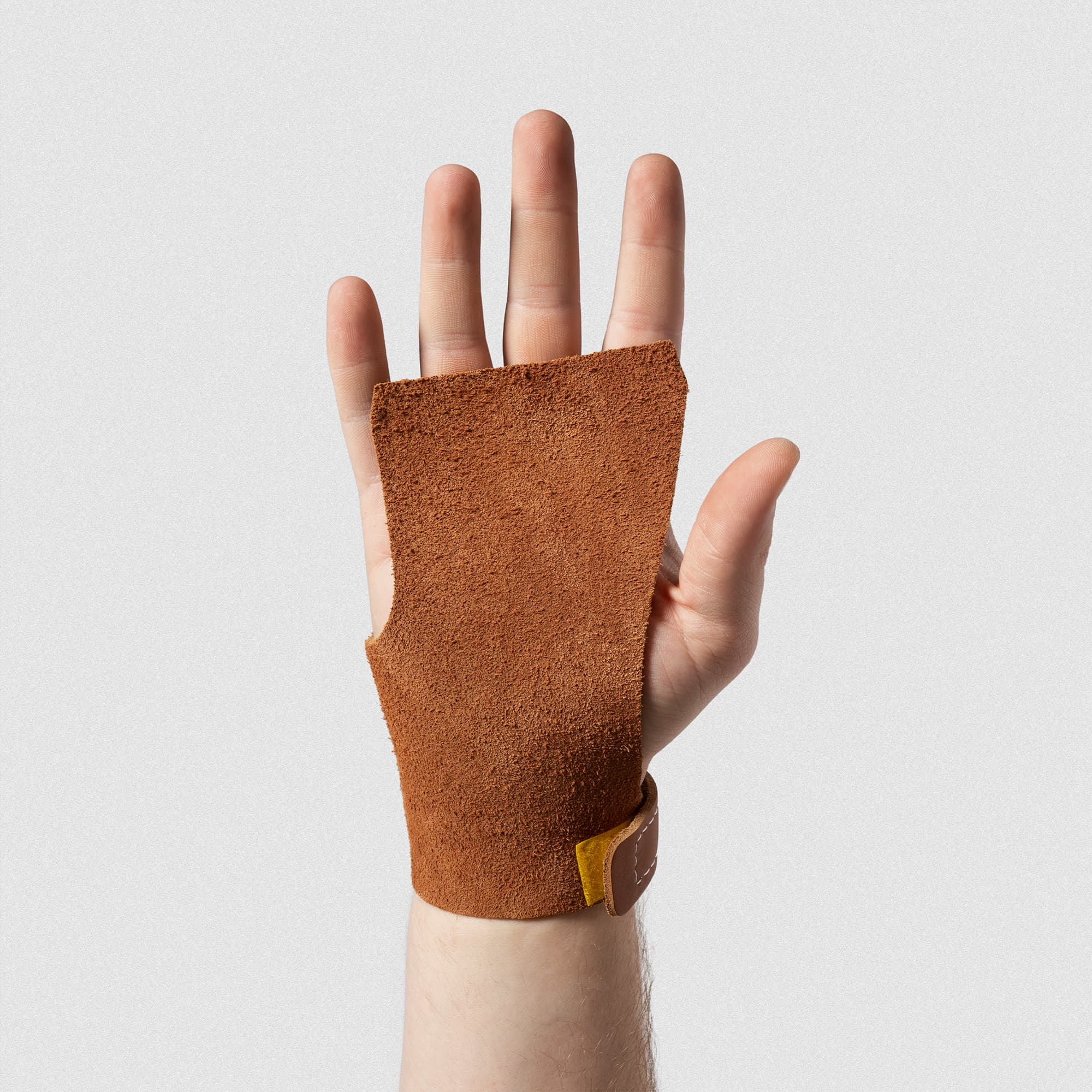Women's Classic Freedom Leather - Tan - On Hand with palm open, facing forward to showcase full coverage and fingerless design