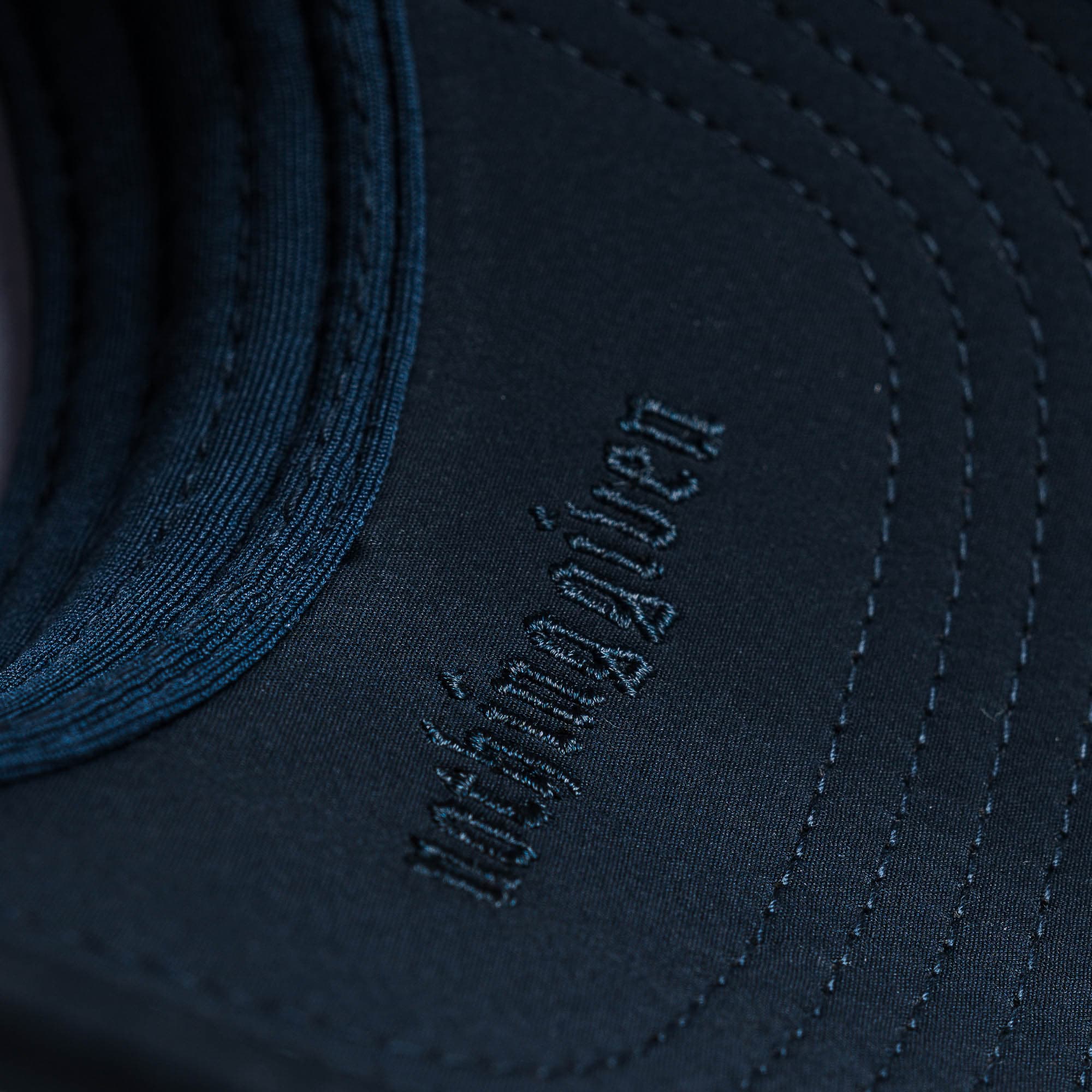 Hybrid Performance 5-Panel Hat - Navy/White detail shot of inside logo