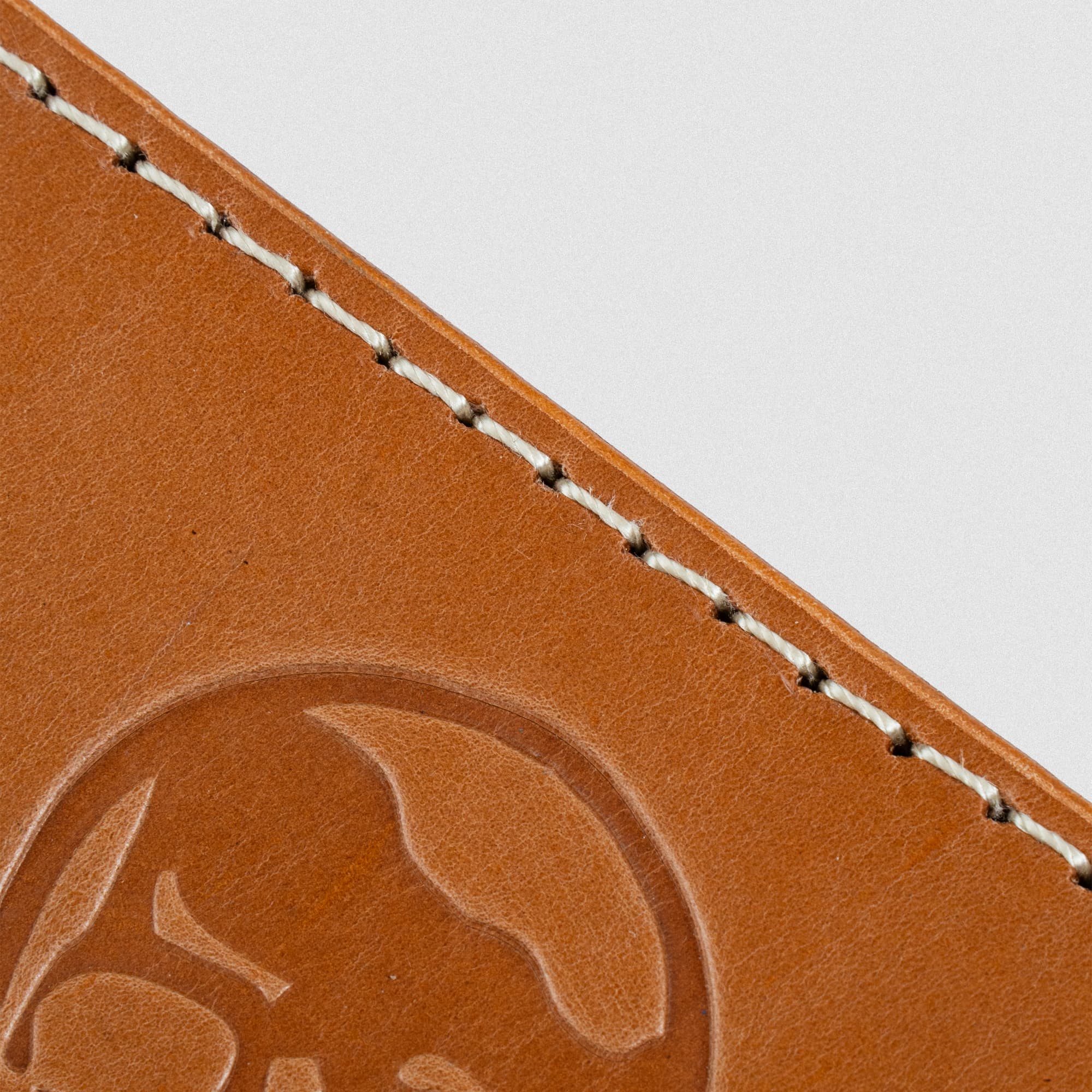 close up detail shot of the stitching on the heritage single prong belt
