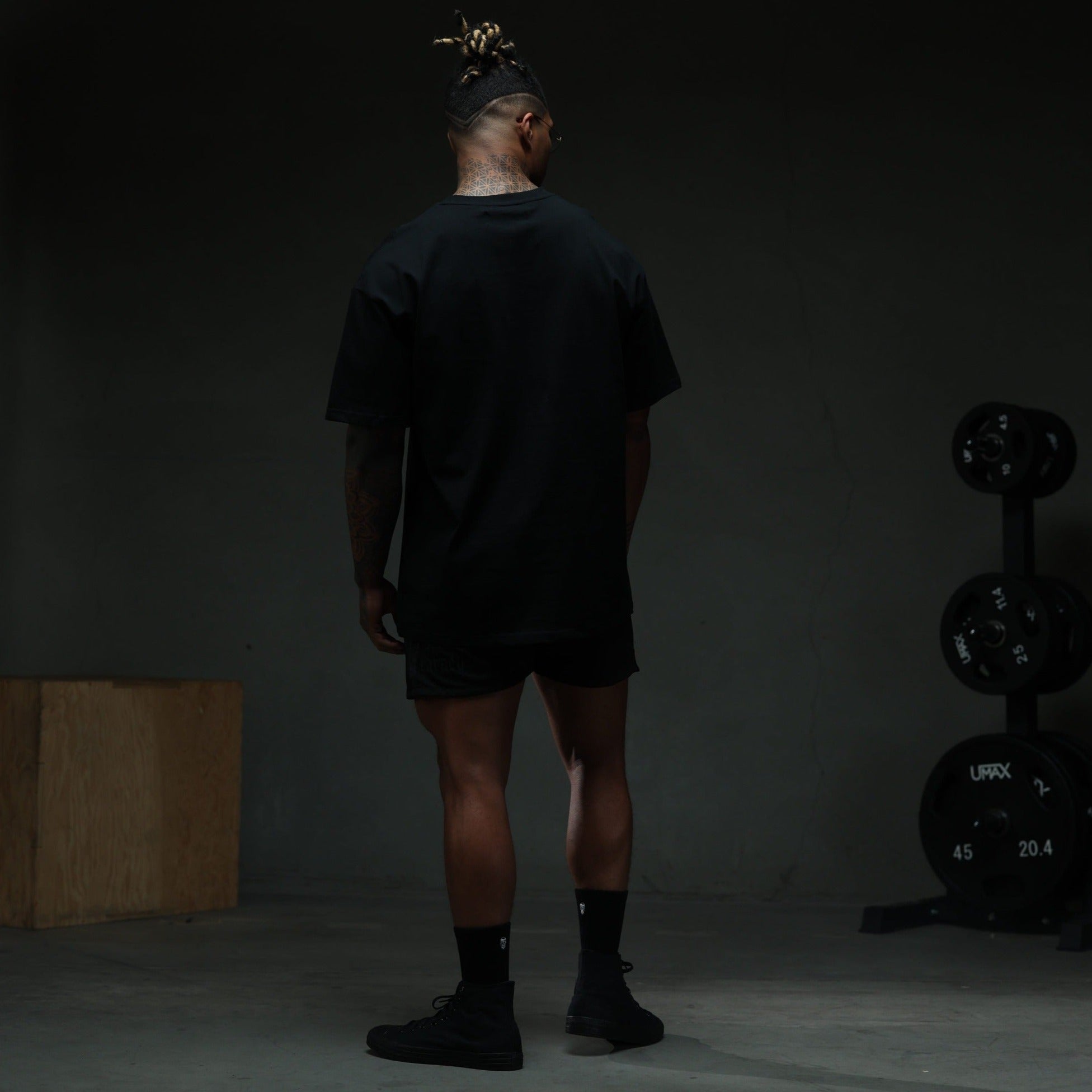 initial shorts black white back studio