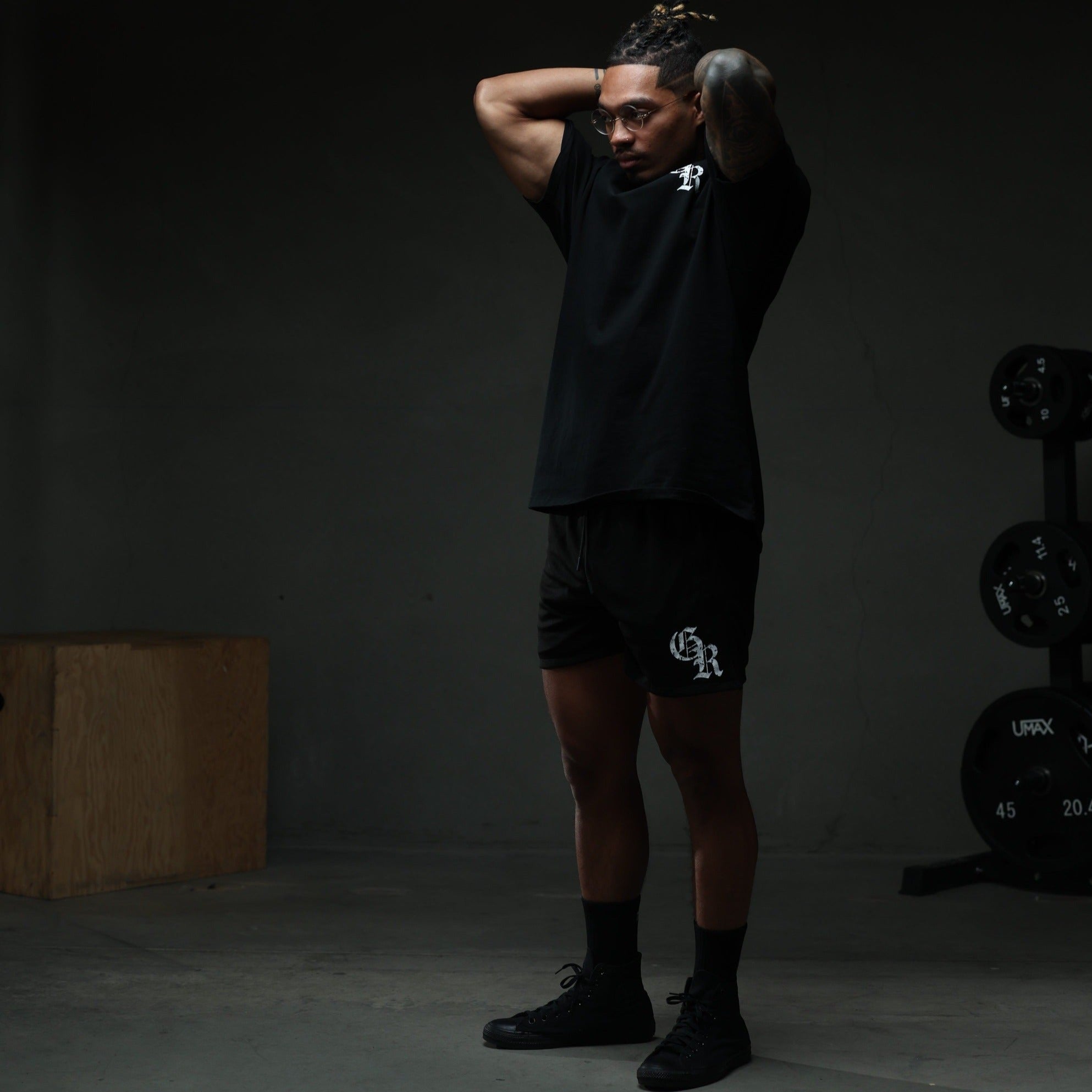 initial shorts black white studio lifestyle