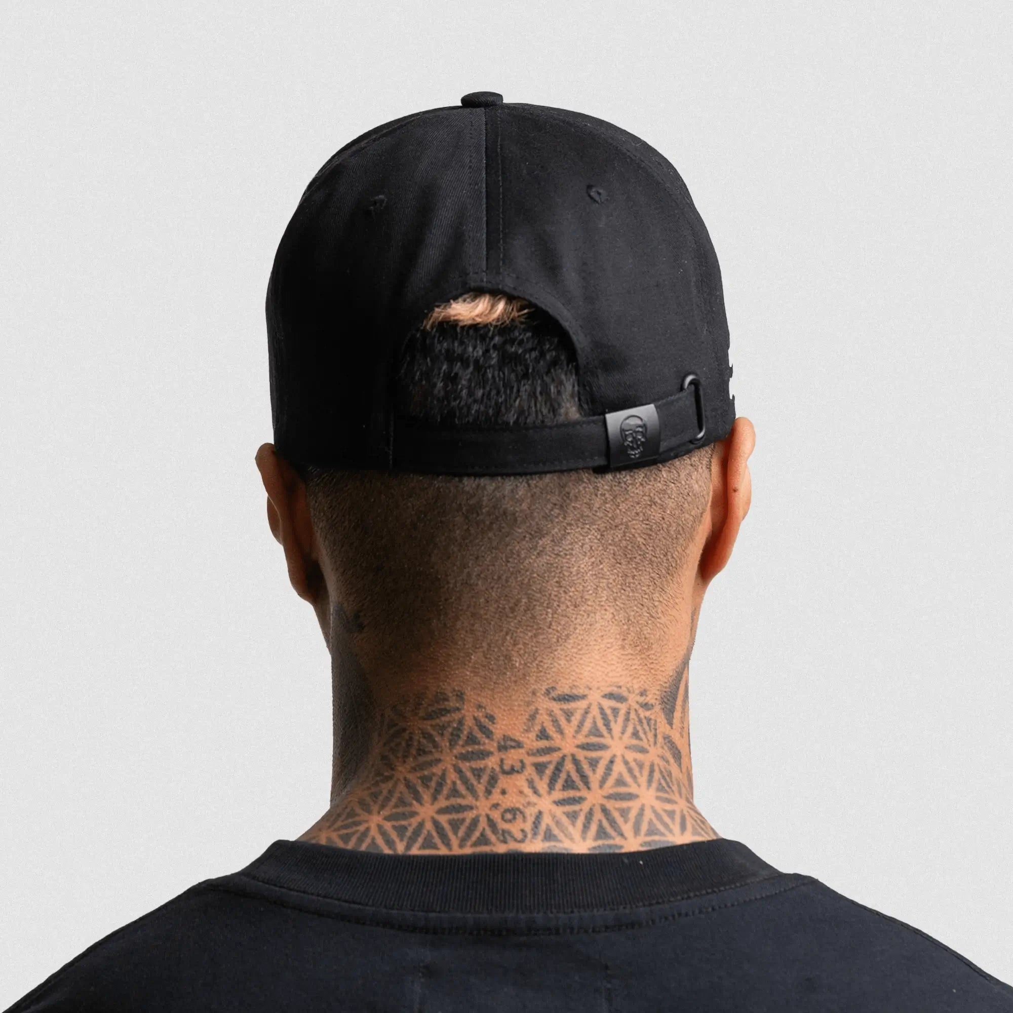 5 panel initial hat on athlete studio gray background back shot