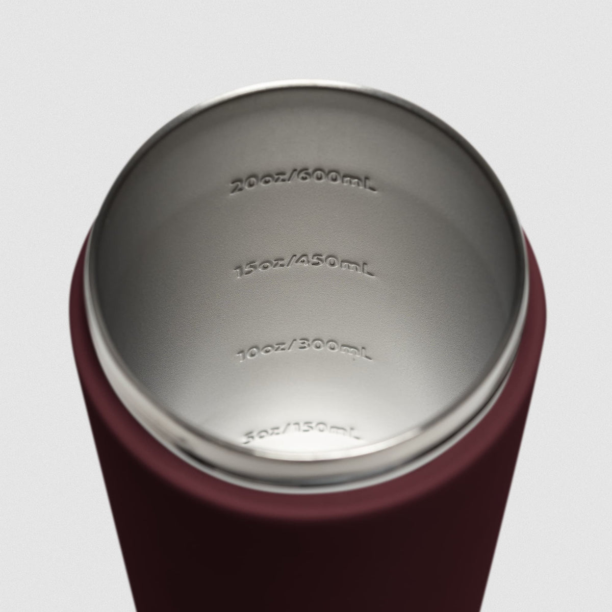 Burgundy red Stainless Steel Shaker on white background showcasing inside of shaker and measurement lines