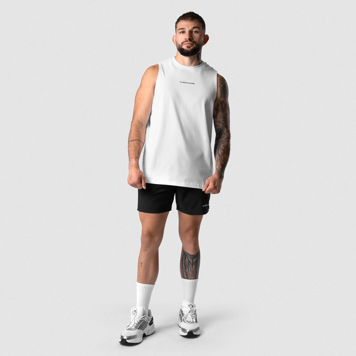 Man wearing Axis Muscle Tank - White full-body front view