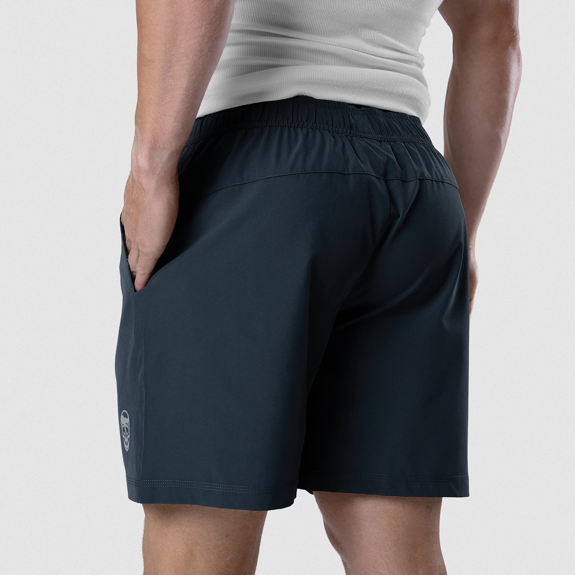 Back view of Men's Conquer 7 Inch Shorts on model - Navy