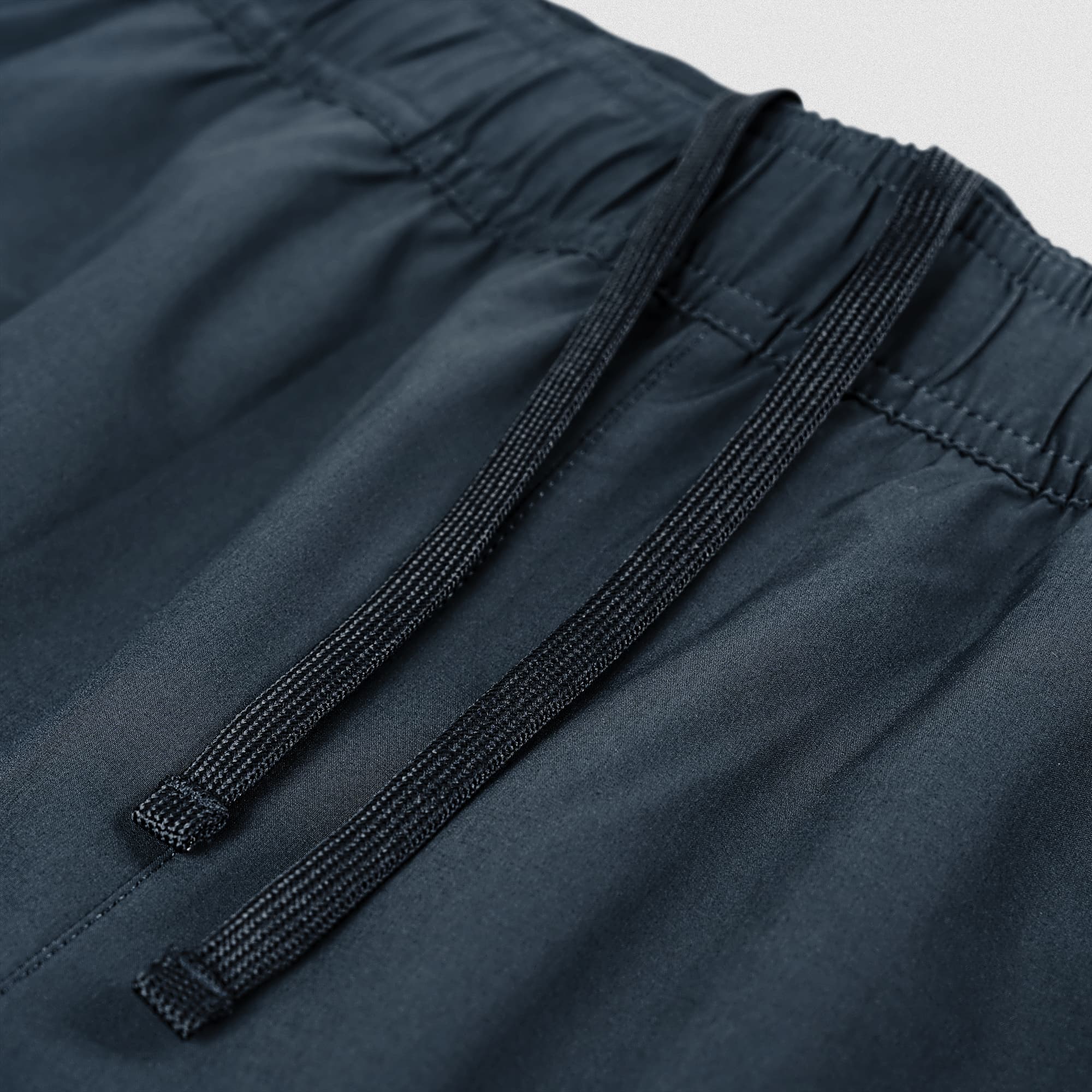 Stretch woven fabric detail on Men's Conquer 7 Inch Shorts - Navy