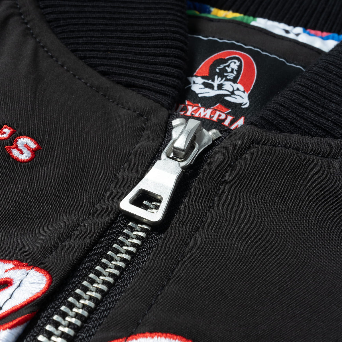 International Division Crop Bomber Jacket | Zipper detailing and feature