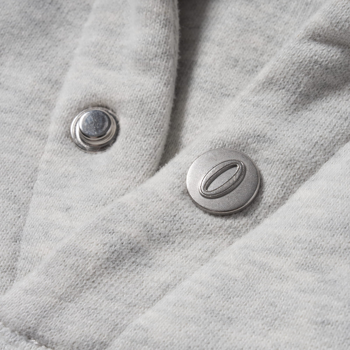 International Division Hoodie | silver snap buttons at hood feature
