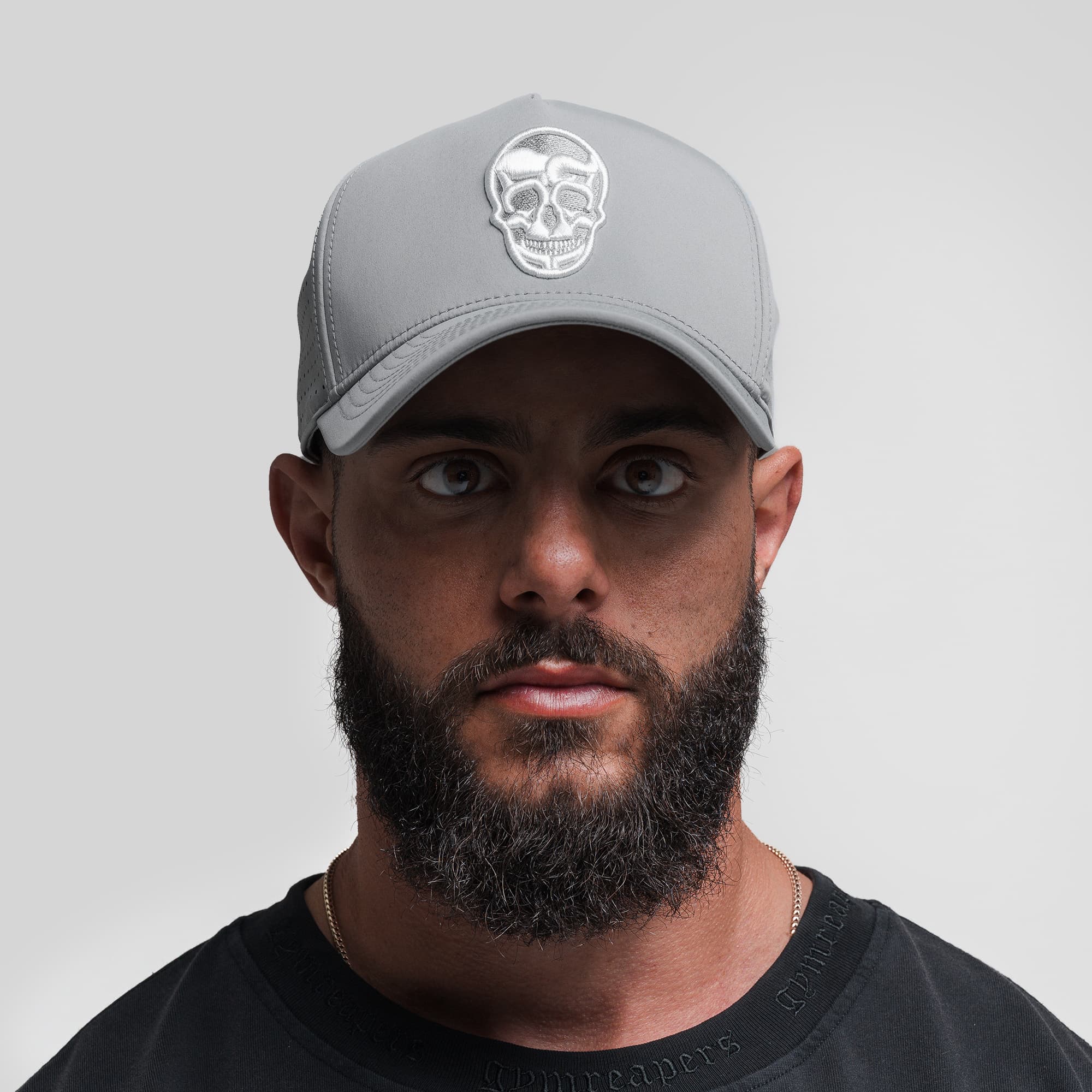Athlete wearing Hybrid Performance 5-Panel Hat - Gray/White front view