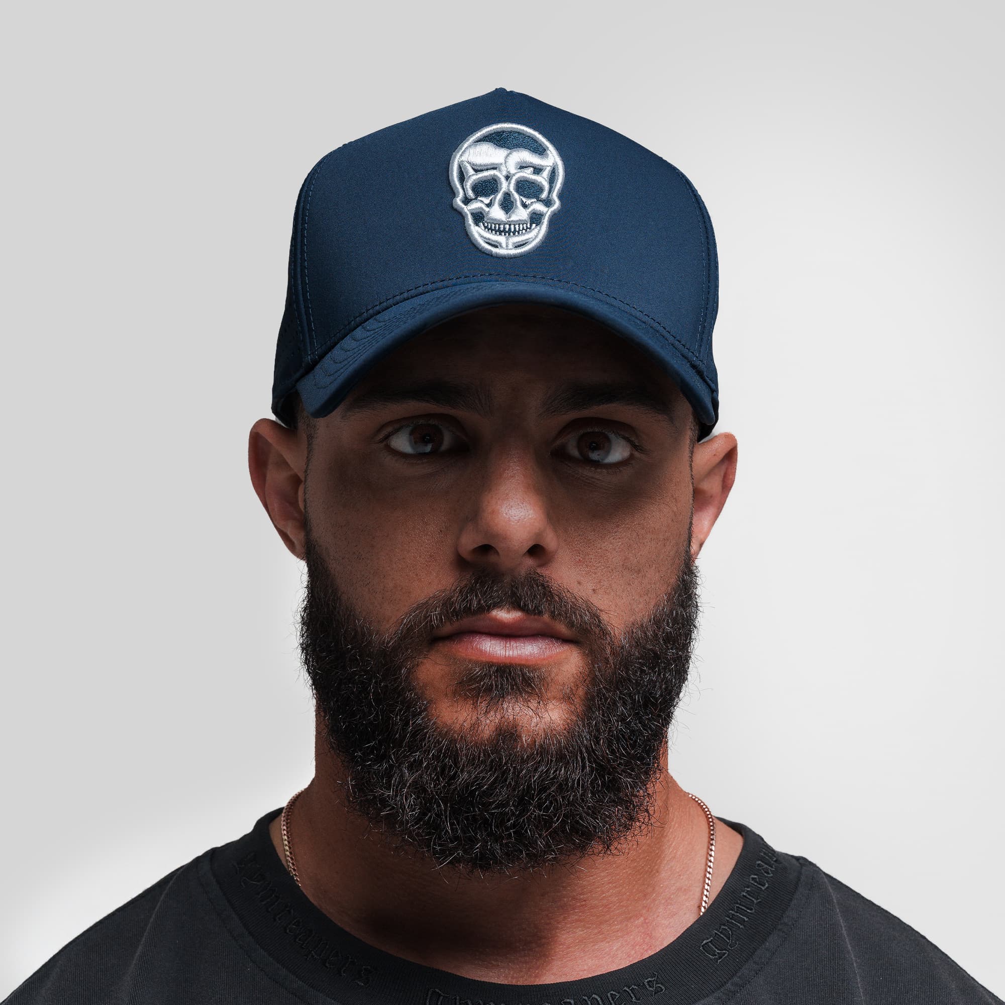 Athlete wearing Hybrid Performance 5-Panel Hat - Navy/White front view