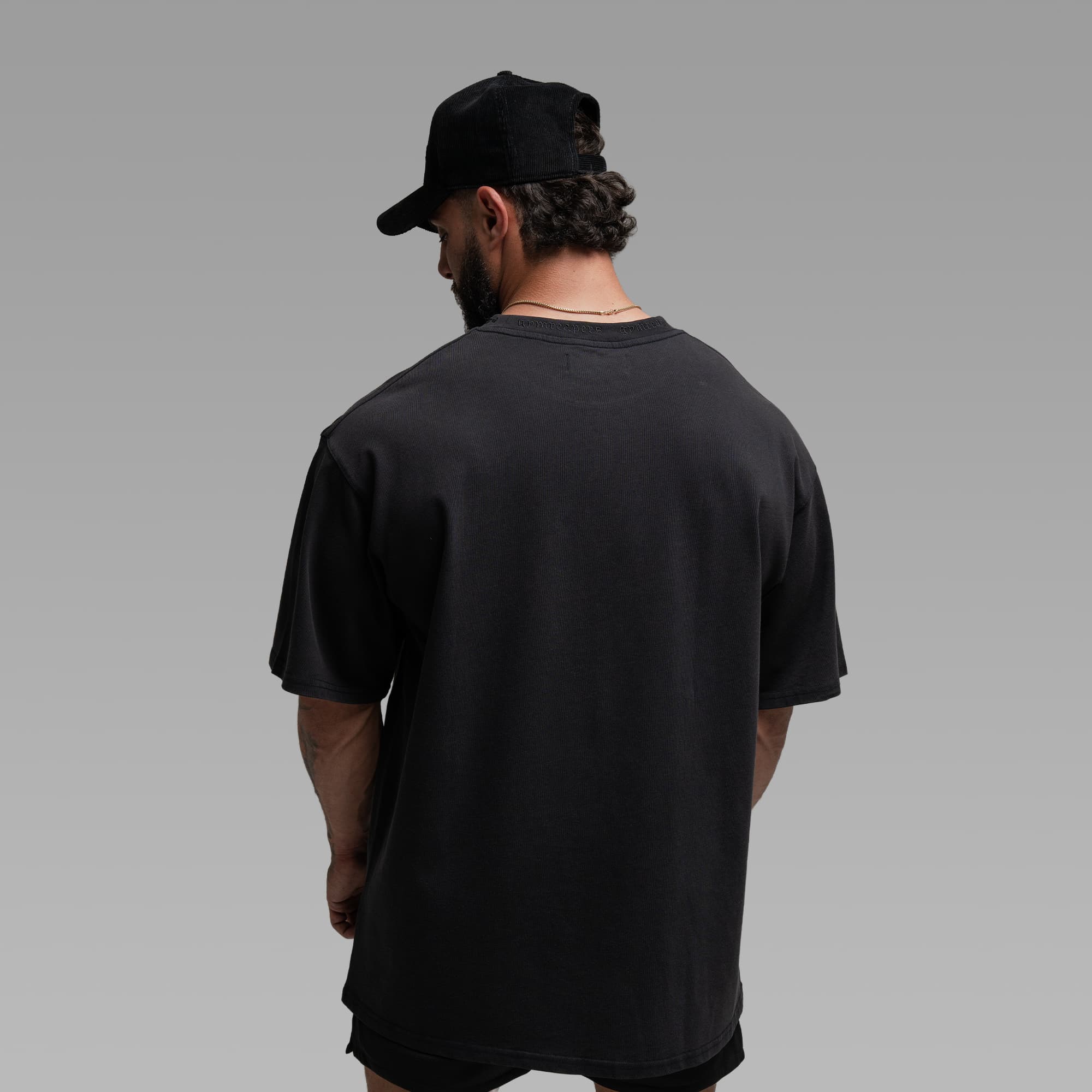 Athlete wearing the Standard Tee half body shot back side