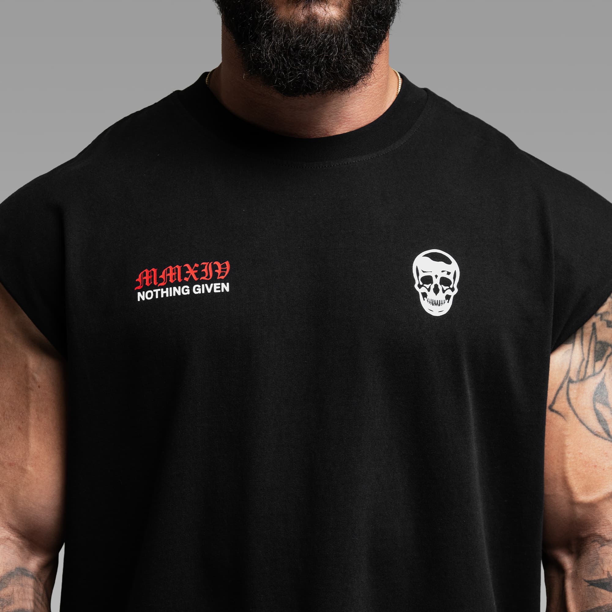 Athlete wearing the Reaper Manifest Cut Off close up shot of front graphics