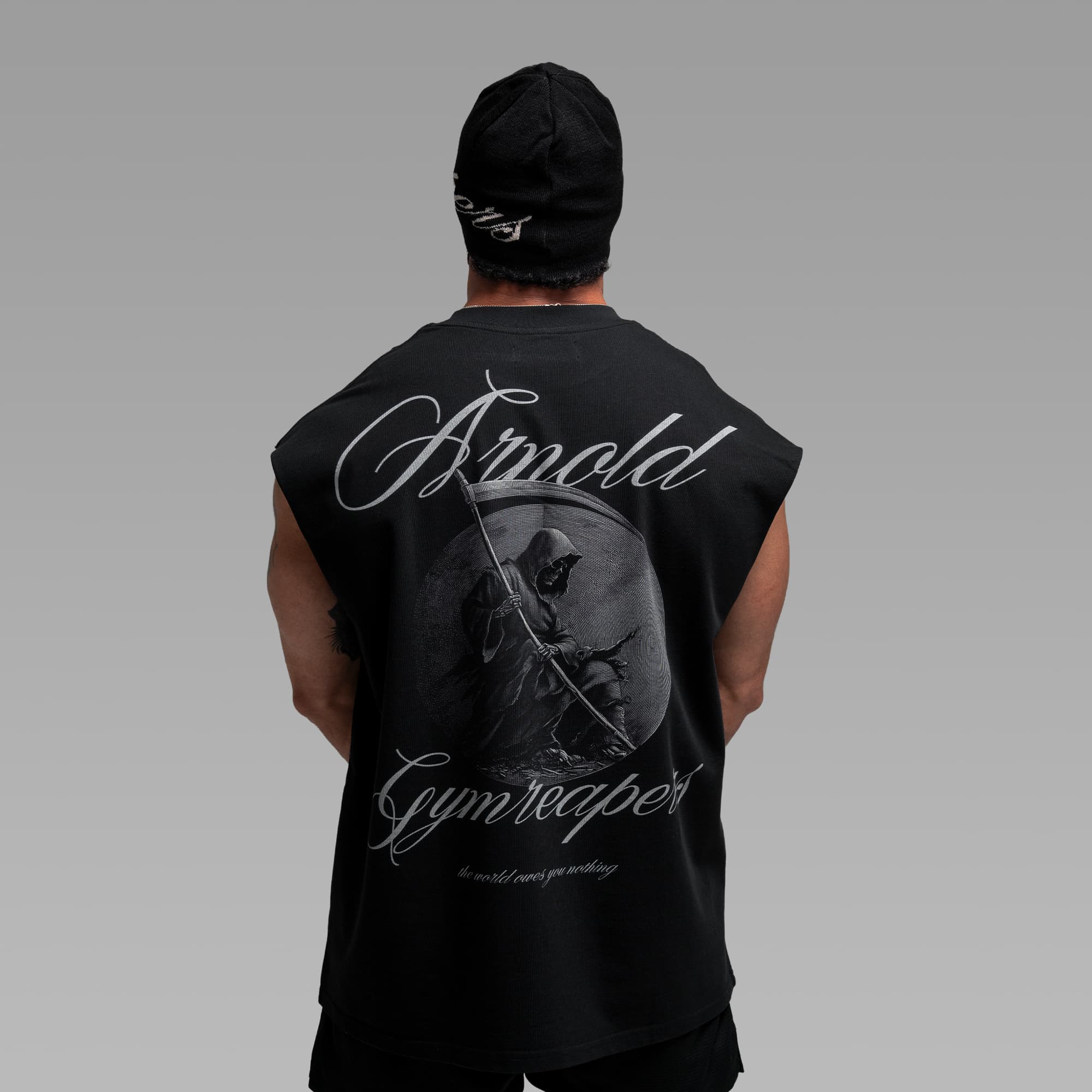 Athlete wearing the Midnight Reaper Cut Off half body shot back view