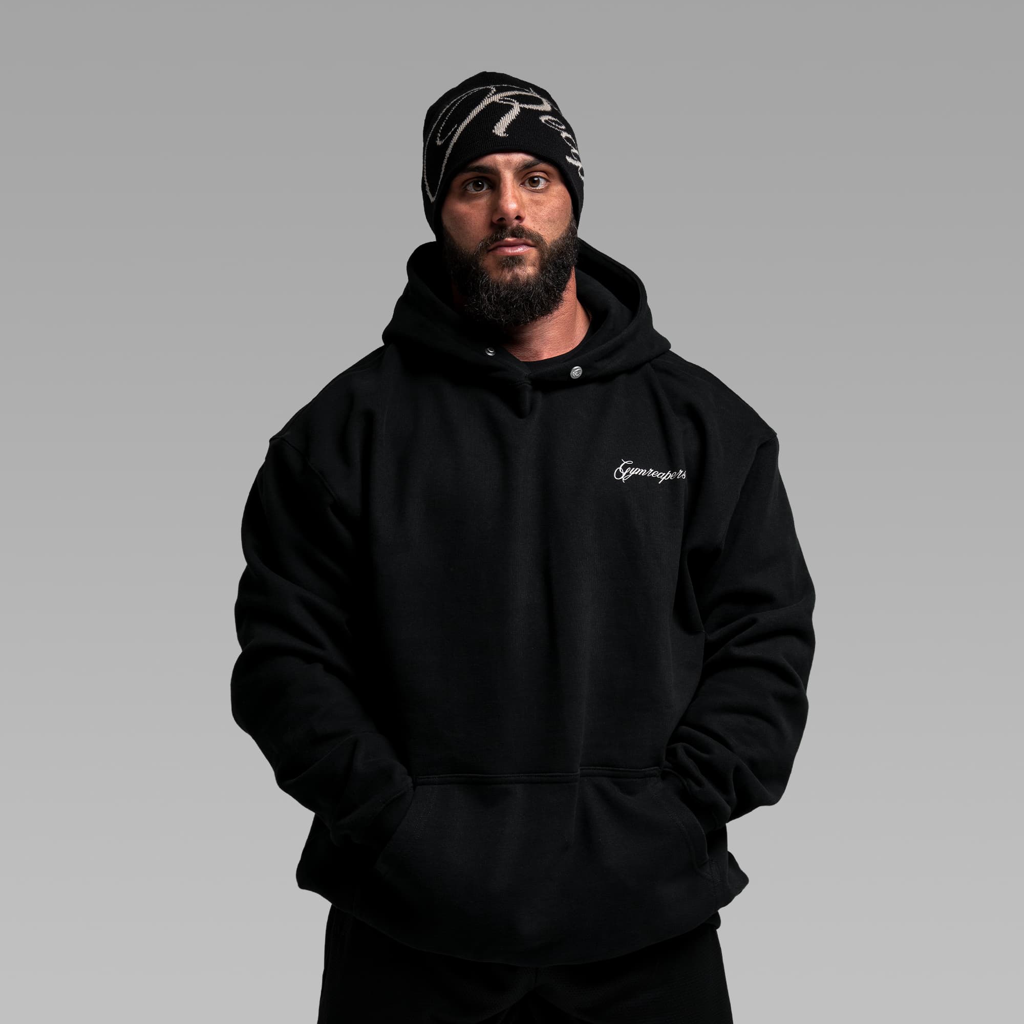 Athlete wearing Midnight Reaper Hoodie half body shot front view