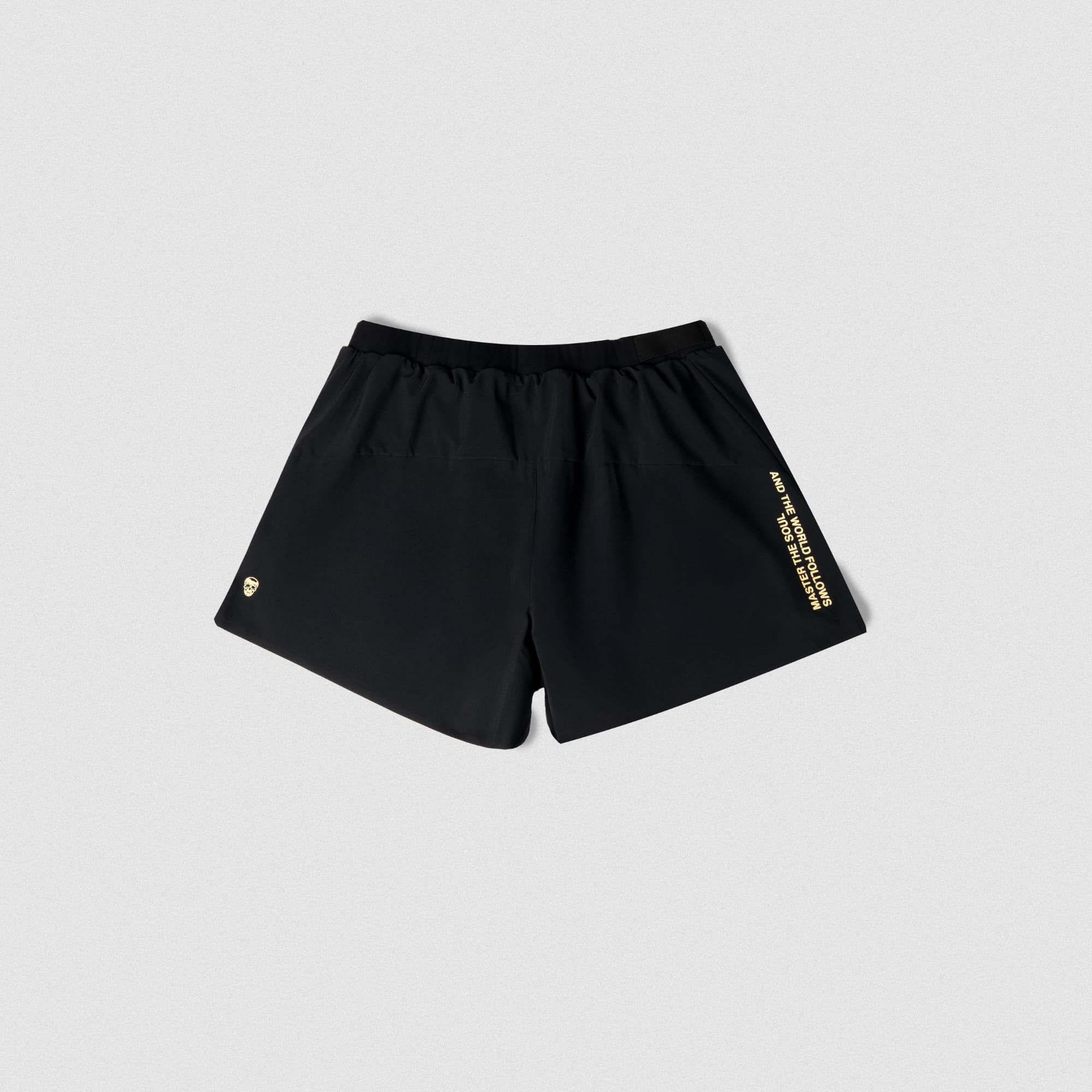 Back view of Gymreapers running shorts featuring skull icon and vertical Master The Soul quote on right leg