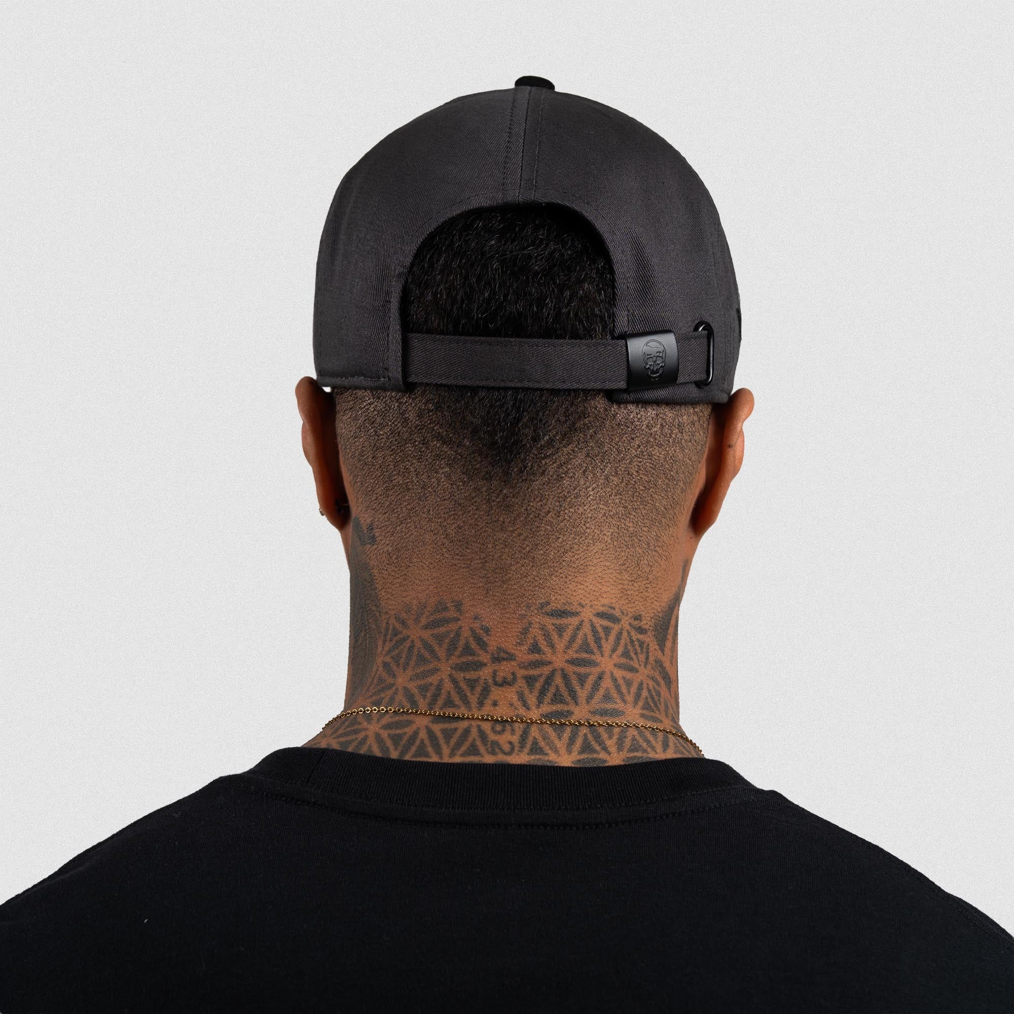 Athlete wearing Gray 5-Panel Initial Suede Hat back view