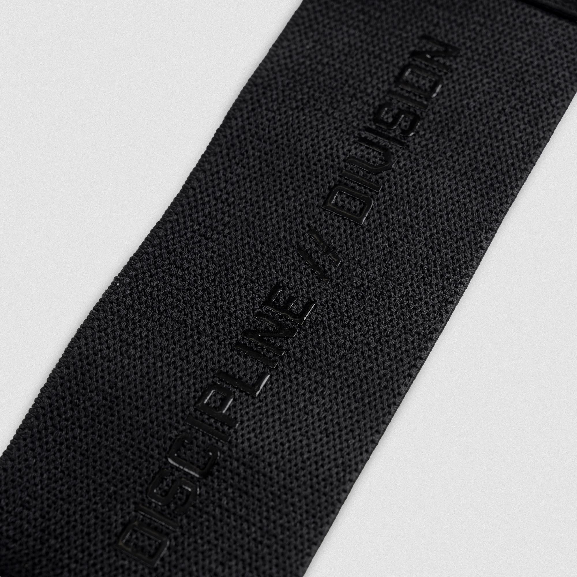 wrist wraps unfolded close up shot of discipline division text