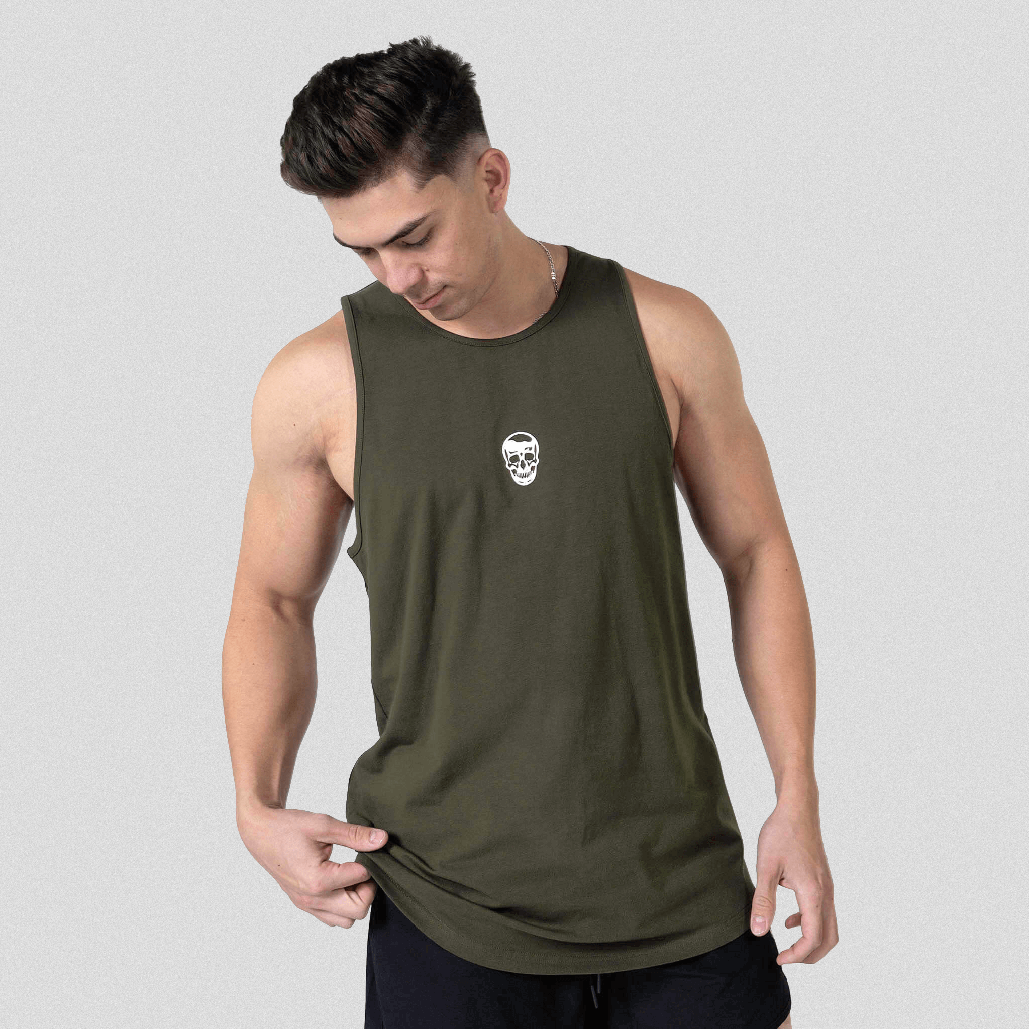 ascend scoop hem tank green studio front side