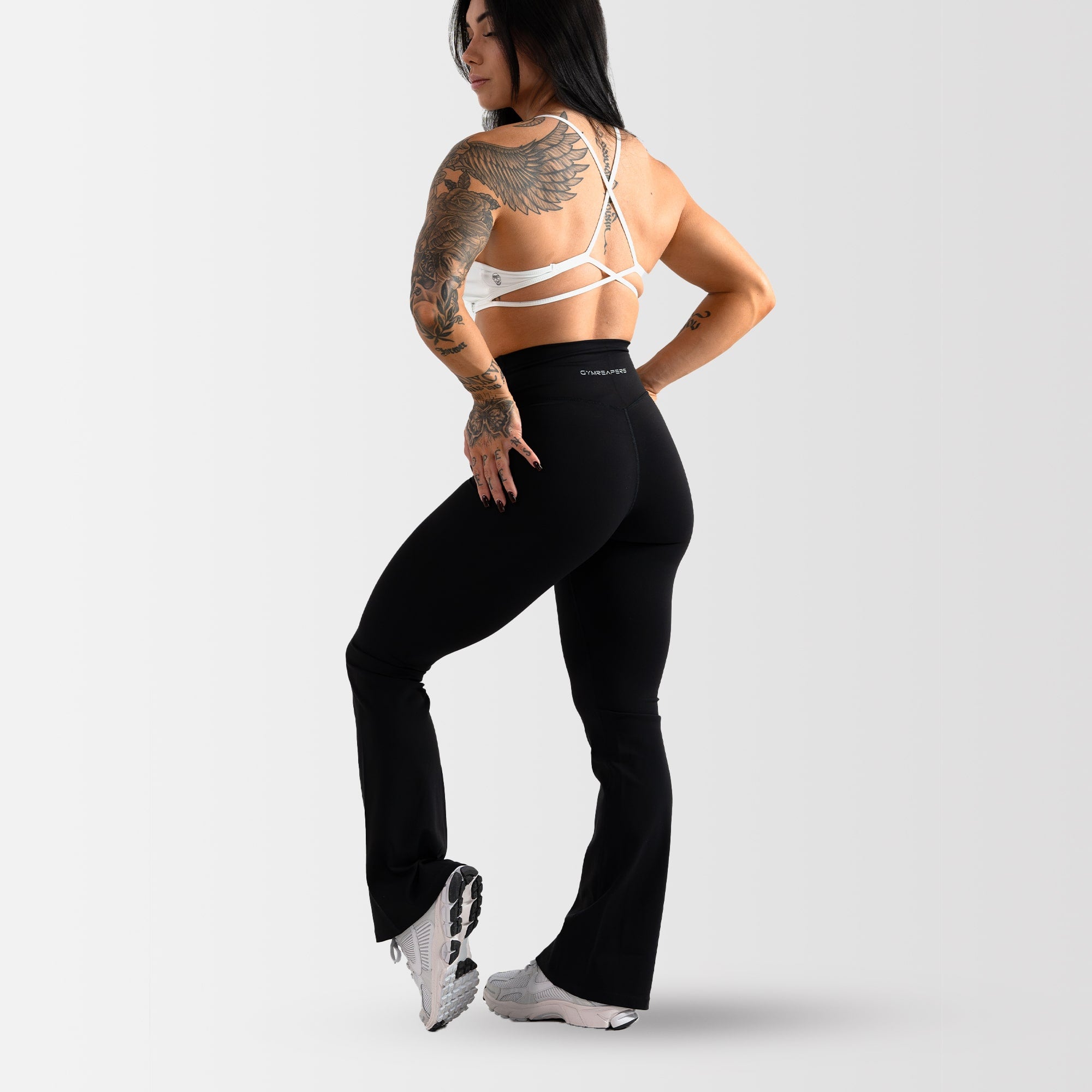 flare leggings black full body back