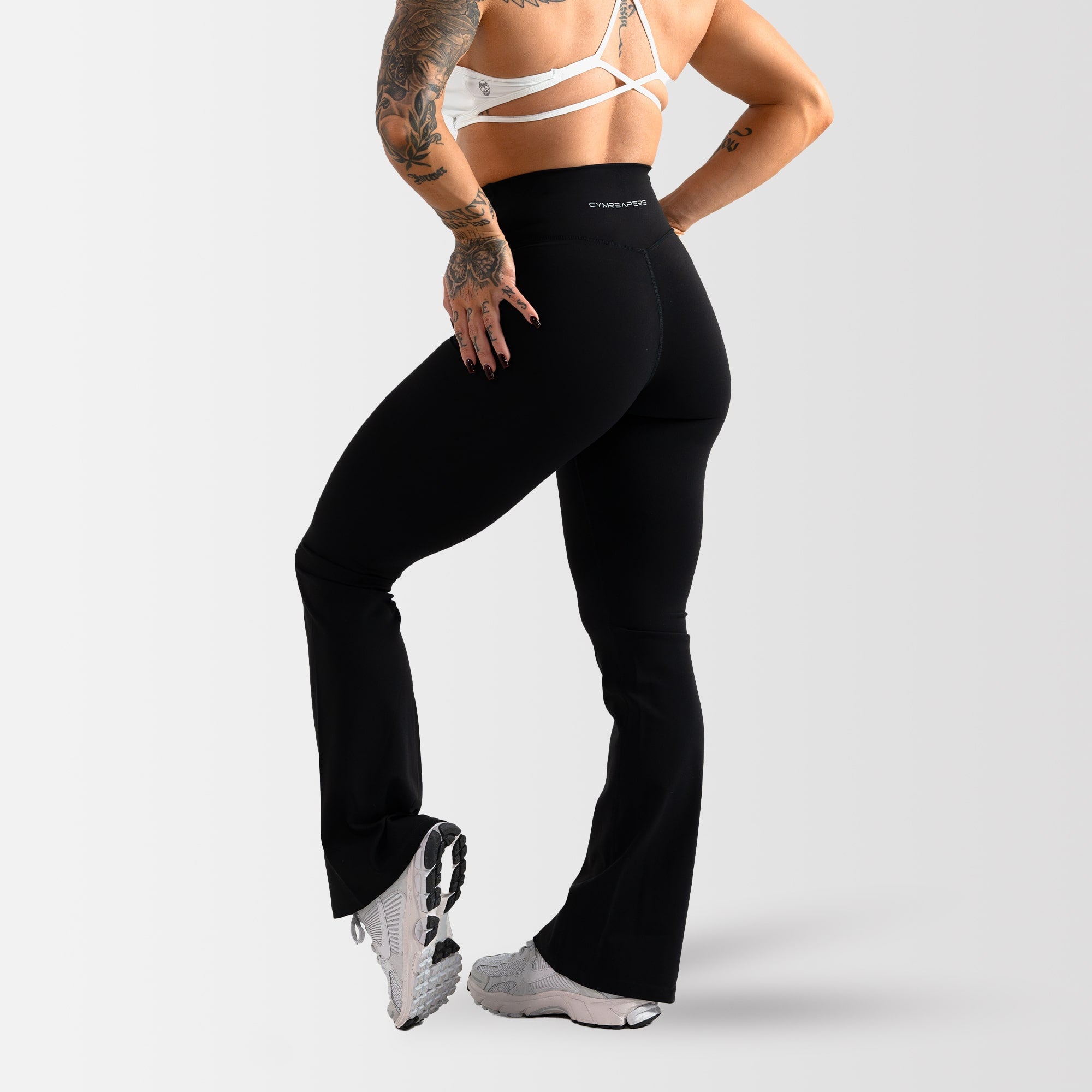 flare leggings black half body back