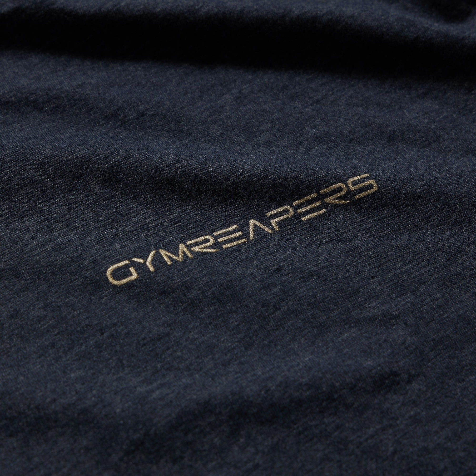 navy gold core logo shirt detail