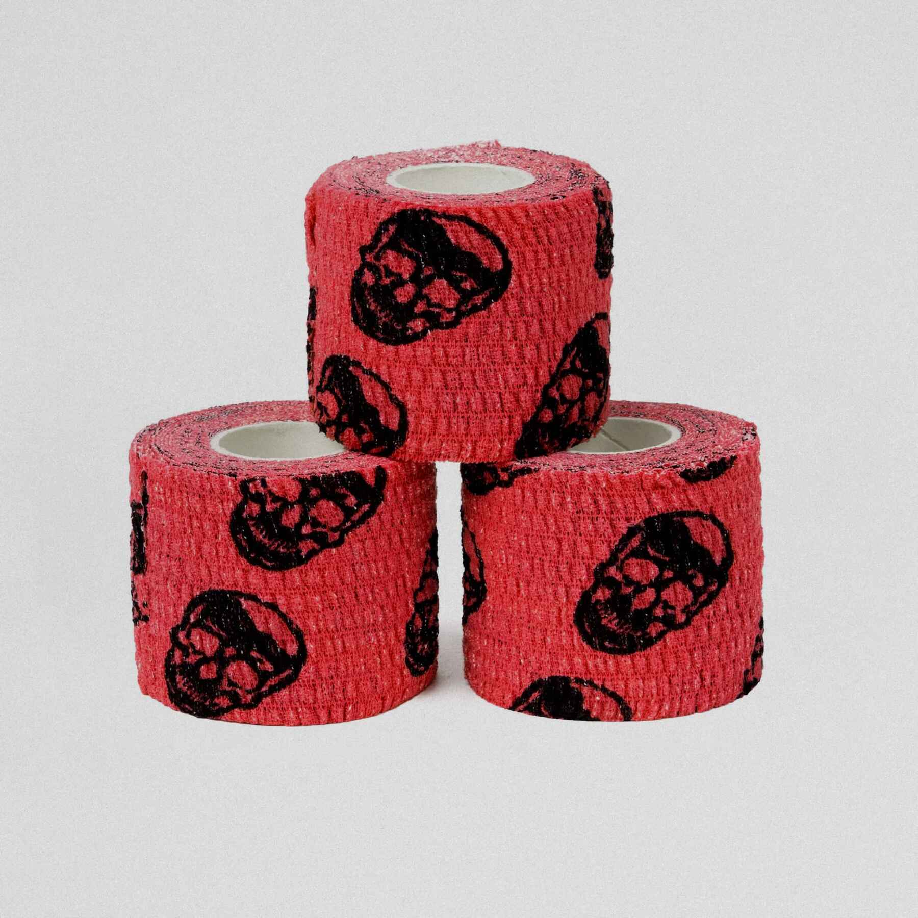 Three pieces of skull tape stacked on top of each other.