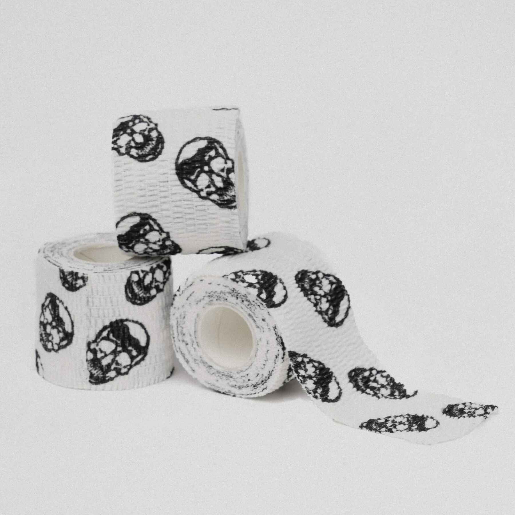 Gymreapers Skull Tape three rolls stacked.