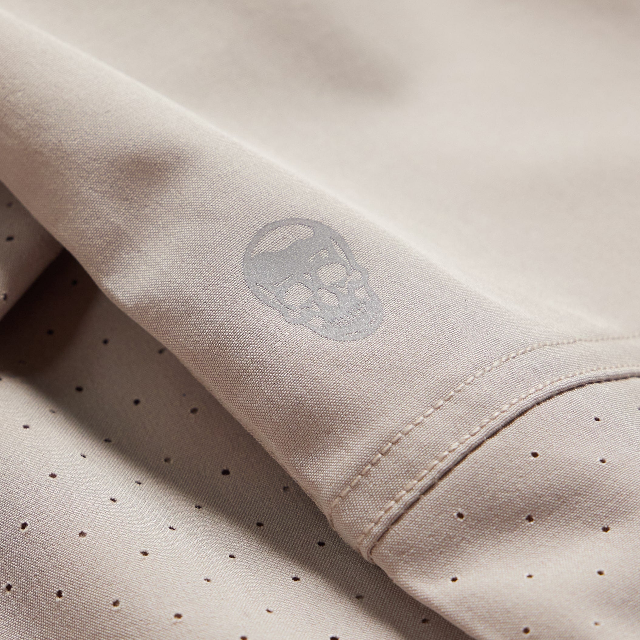 taupe performance jogger skull detail